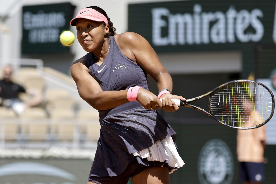 Naomi Osaka secures a thrilling victory over Lucia Bronzetti at Roland Garros, marking her first Grand Slam win since the 2022 Australian Open.